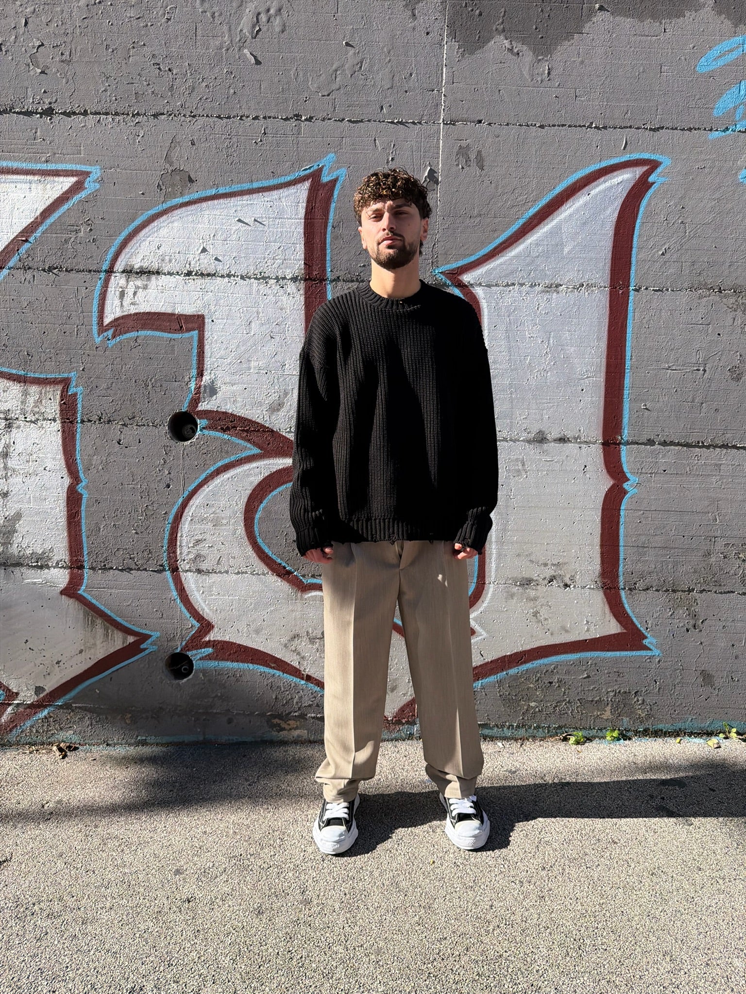 PULLOVER CON ABRASIONI