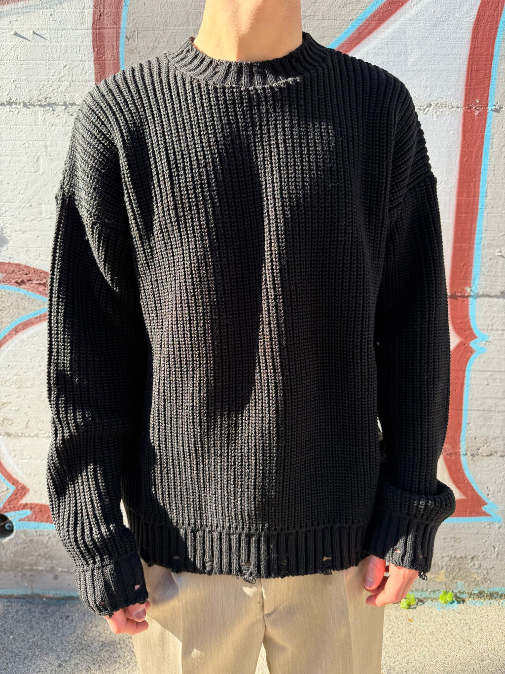 PULLOVER CON ABRASIONI