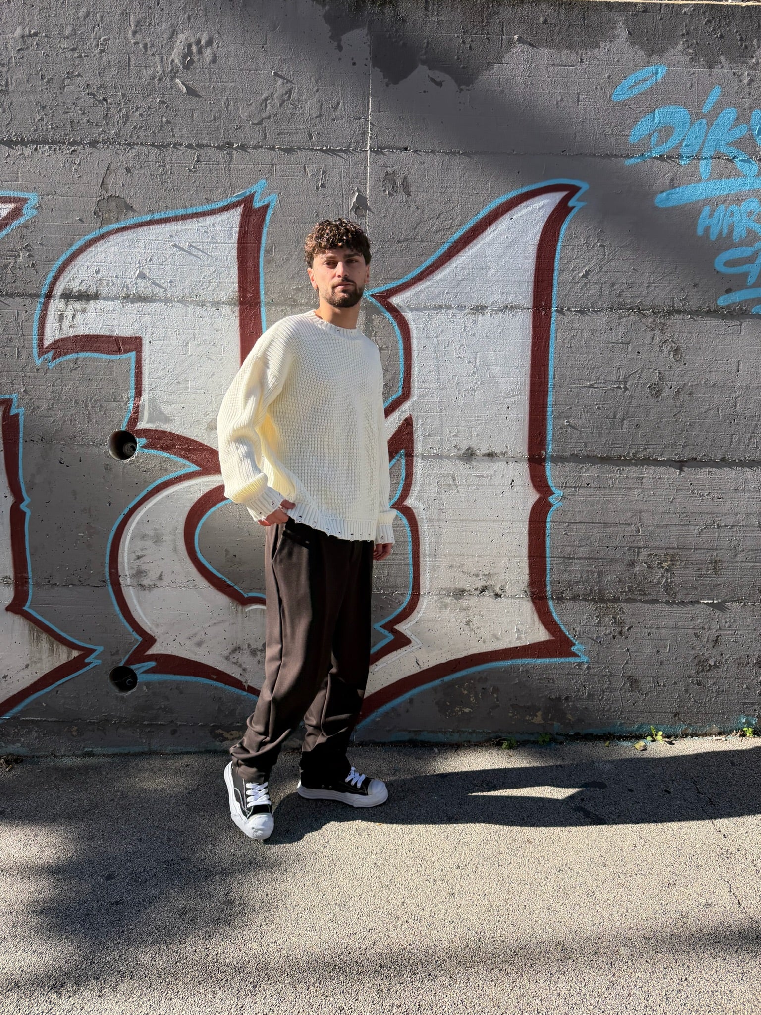 PULLOVER CON ABRASIONI